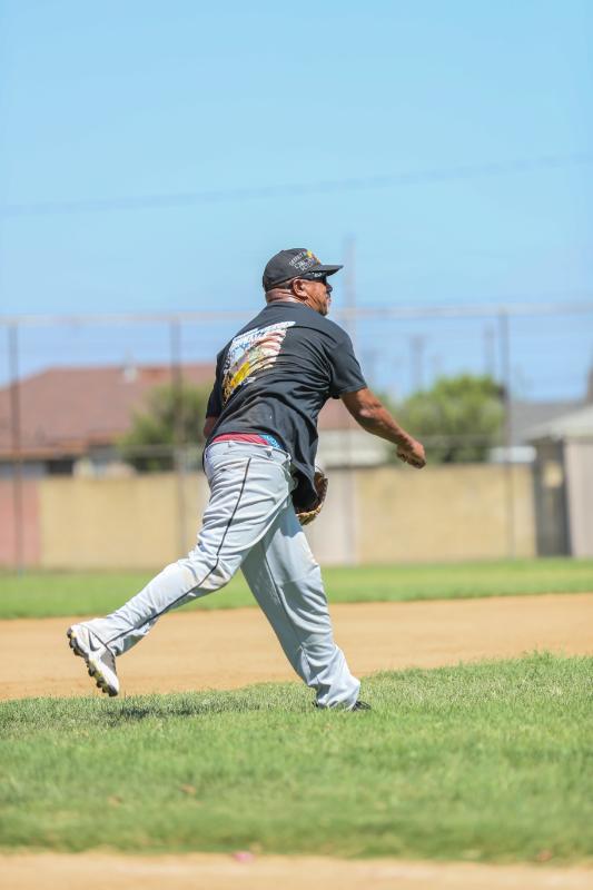 Softball player practicing Softball player practicing