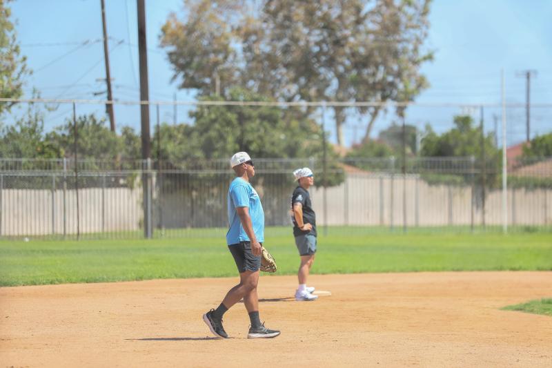 softball players in infield softball players in infield